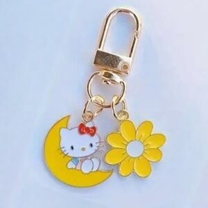 Hello Kitty Keychain Sitting on Crescent Moon